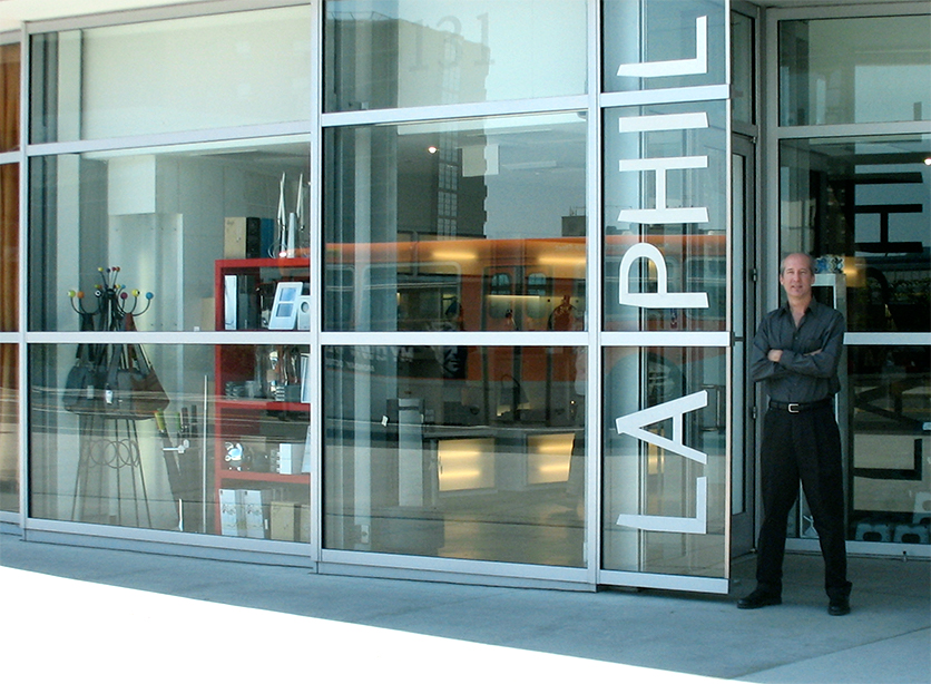 Philip Gordon at the Frank Gehry Walt Disney Concert Hall in Los Angeles in front of a window with vinyl letters saying LA PHIL for the Los Angeles Philharmonic orchestra. Pretty cool if you ask me.