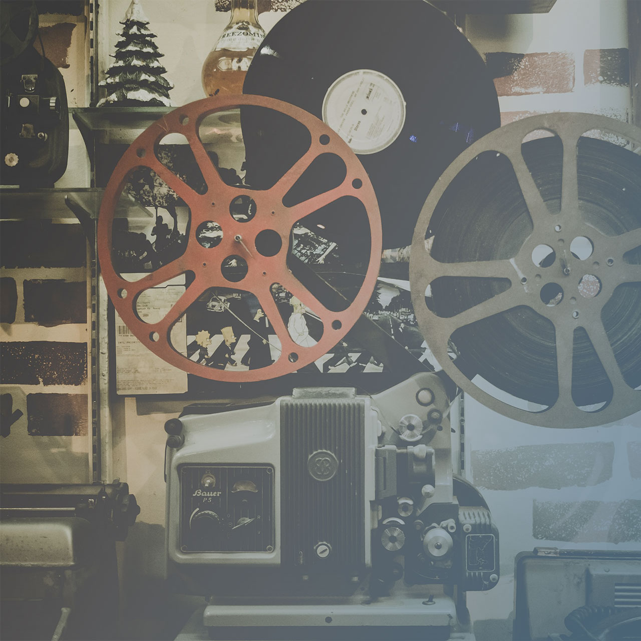 Content creation video, motion graphics, writing. Old movie projector image